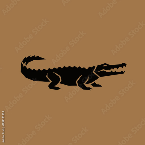 Black silhouette of an alligator with open jaws on a brown background.