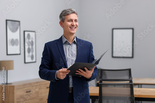 Real estate appraisal. Inspector with folder conducting property valuation at home