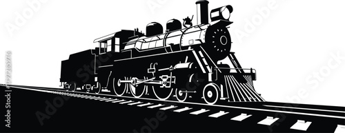 Steam locomotive silhouette on railway tracks