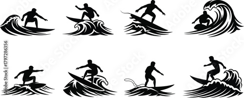 Silhouettes of surfers riding ocean waves
