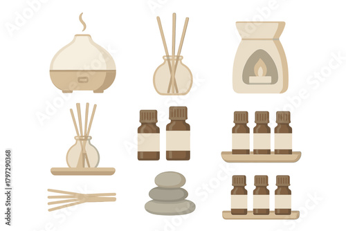 Aromatherapy and spa objects collection featuring essential oil bottles, diffusers, and stacked stones