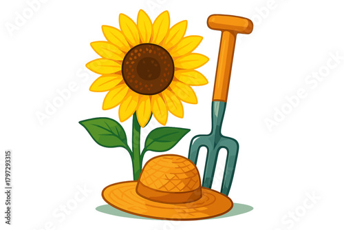 Bright sunflower blossom next to a straw sun hat and essential gardening tools