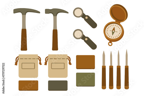 Essential tools for geology and archaeology fieldwork: hammers, compass, and magnifying glass
