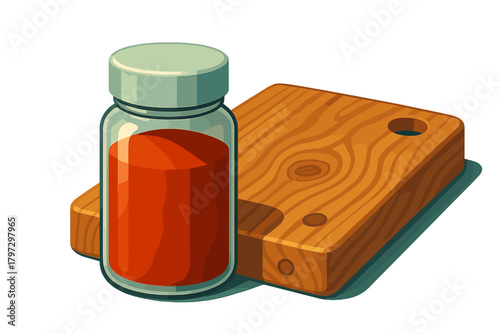 Clear glass jar filled with vibrant red spice powder beside a rectangular wooden cutting board