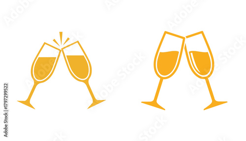 Two golden champagne glasses clinking together