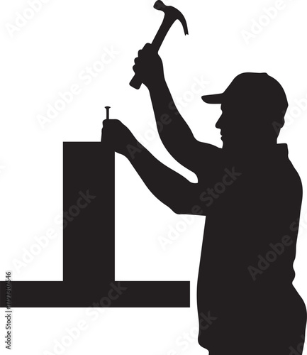 Silhouette of a handyman constructing with hammer and nail in a workshop setting
