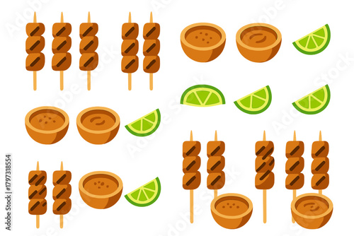 Delicious satay skewers served with bowls of dipping sauce and bright green lime slices