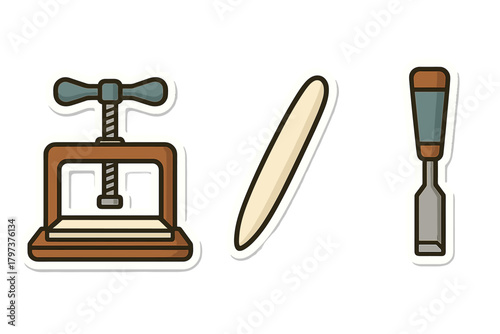 Professional woodworking tools set including screw clamp, bone folder, and wood chisel