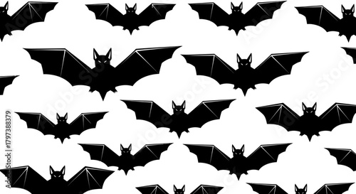 A repeating pattern of silhouetted black bats with outstretched wings.