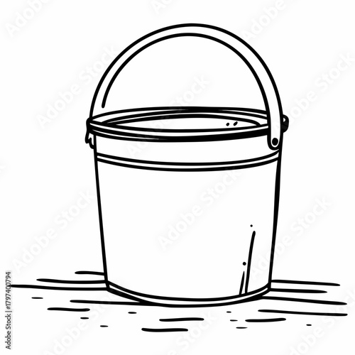 Simple metal bucket with handle on wooden surface  