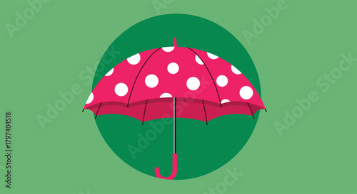 A cheerful pink polka dot umbrella ready to protect you from the rain.