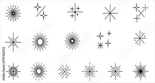 Collection of intricate decorative starbursts and snowflake like ornamental elements in black and white