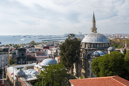 Cityscape view with domed buildings and sea in Istanbul, Turkey