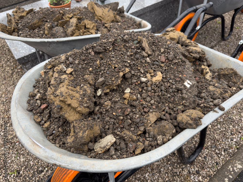 custom made wallpaper toronto digitalClose-up of a wheelbarrow overflowing with heavy excavated soil, dirt, and rocks