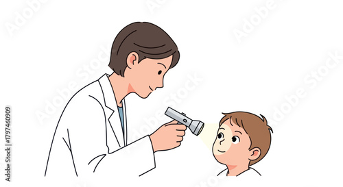 Pediatrician Examining Young Boys Eye with Flashlight.