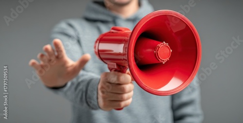 businessman shouting through megaphone