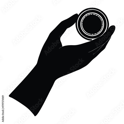 Hand Holding Golden Coin Silhouette