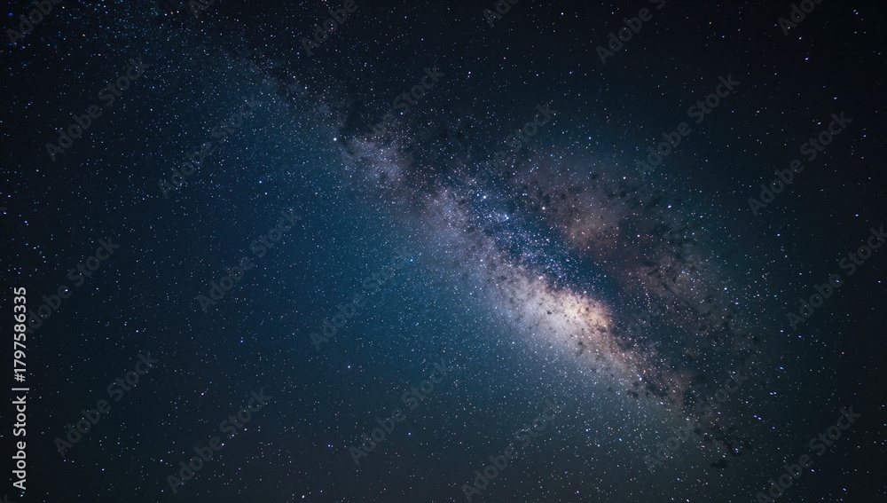 Fototapeta premium Breathtaking night sky capture showcasing the Milky Way with a grainy texture in a long exposure shot