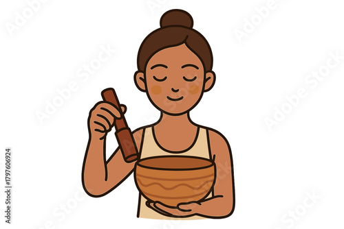 Person meditating with a singing bowl for sound therapy and spiritual healing