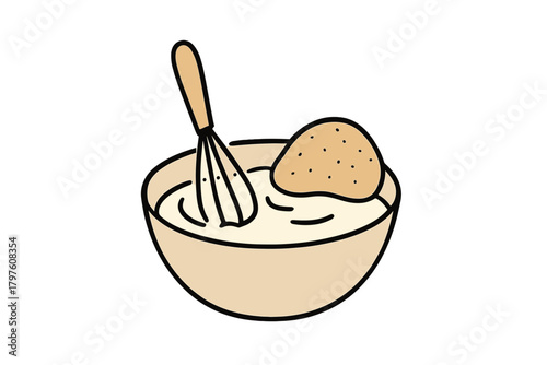 Kitchen whisk mixing batter in a bowl with cookie dough ready for baking preparation