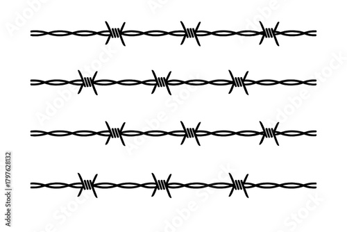Repeating horizontal lines of dangerous sharp metal barbed wire security fence barrier