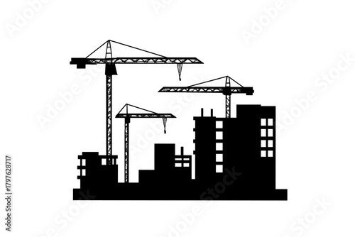 Urban construction site silhouette with three large tower cranes and developing buildings