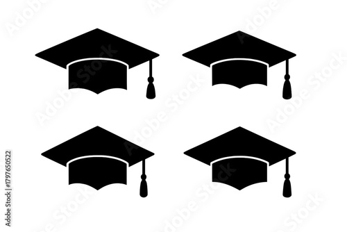 Four black graduation caps with tassels representing academic achievement and education success
