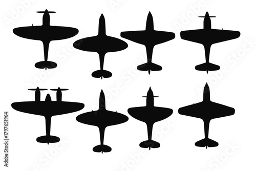 Set of vintage military fighter aircraft silhouettes viewed from above