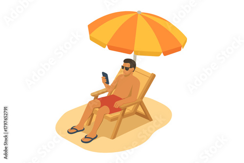 Man relaxing on a beach chair under a striped umbrella while checking his mobile phone on vacation