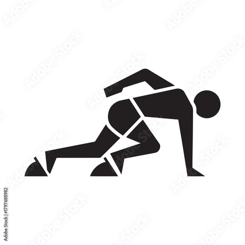 Runner in starting blocks ready to sprint