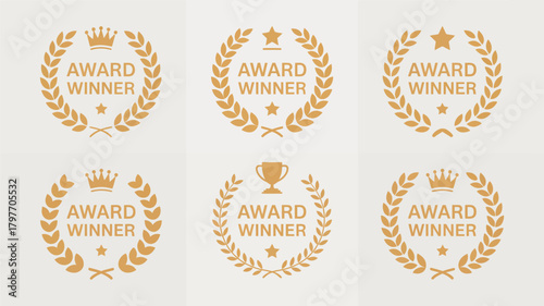 Set of golden award winner emblems featuring laurel wreaths, crowns, stars, and trophies, representing achievement.