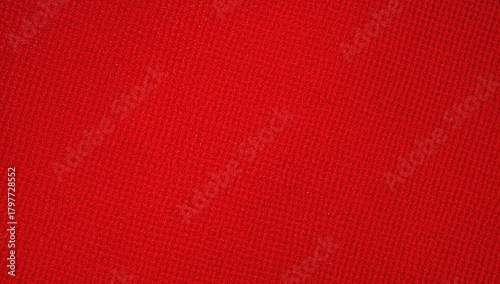 Close-up of red checkered synthetic material texture, suitable for UI backdrop