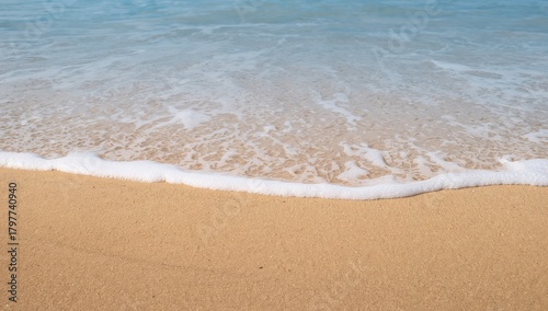 Fototapeta Naklejka Na Ścianę i Meble -  Soft wave on the sandy beach, ideal backdrop for relaxation or leisure activities