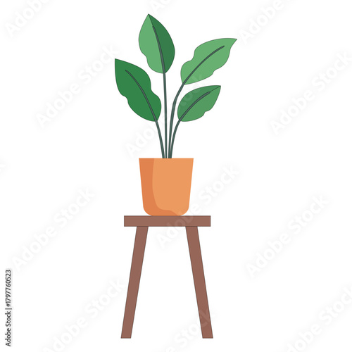 Potted houseplant on a wooden stool