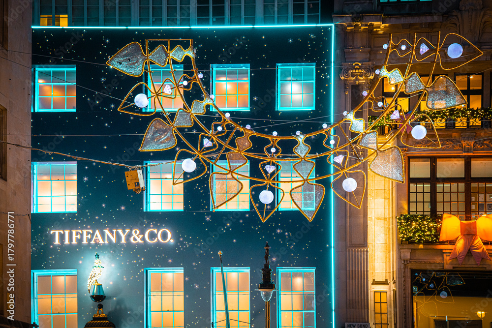Fototapeta premium Mayfair Festive Lights, Tiffany & Co Retail Store Logo, Storefront, Burlington Gardens Street Christmas Decorations, Bond Street, Central London, England, UK - November 2025