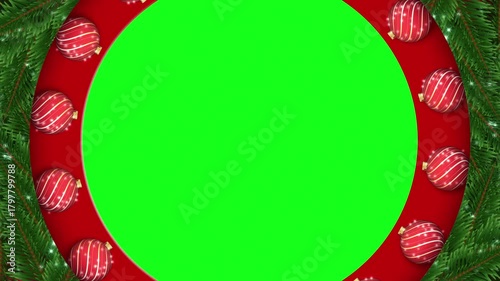 A circular green screen space is framed by a red background. Fir branches and striped holiday baubles create a decorative border.