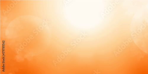 Abstract light orange background design with bright sun flare and blurred summer sunset glow