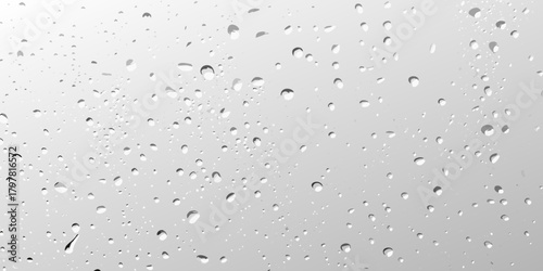 Abstract background of water droplets on glass with a light gray gradient and subtle shadows