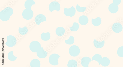 Delicate polka dot pattern of light blue shapes on cream background for soft designs