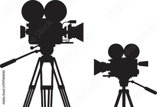 Vintage film cameras on tripods movie cameras black silhouette