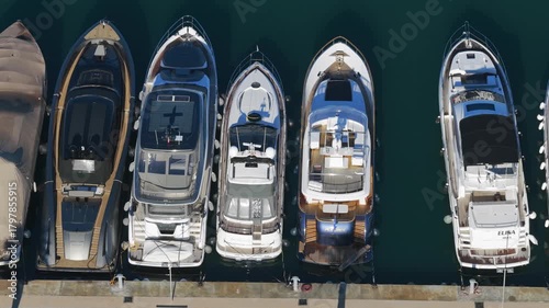 Aerial View: Multi-Million Dollar Superyachts Moored in the Premier Luxury Marinas of Ibiza