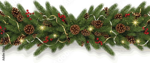 Festive Christmas garland with pine cones, red berries, and twinkling lights for holiday decoration