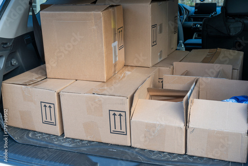 cardboard boxes in SUV trunk