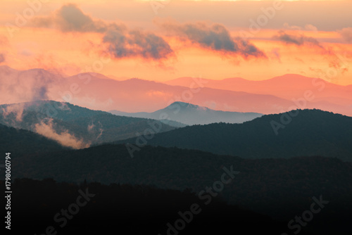 Mountain layers during moody pink sunrise