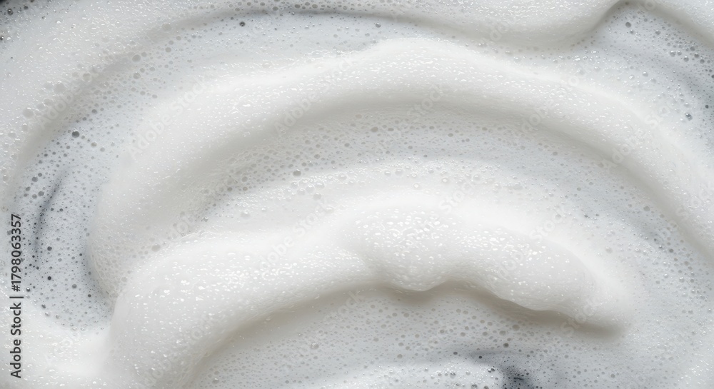 Obraz premium Close up texture of thick white detergent suds creating a fluffy background, suitable for cleaning, hygiene, and washing concepts ,light ,washing ,suds