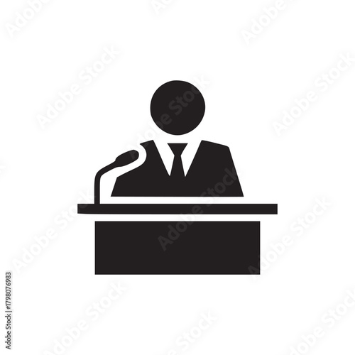 A black silhouette of a person speaking at a podium with a microphone on a white background image