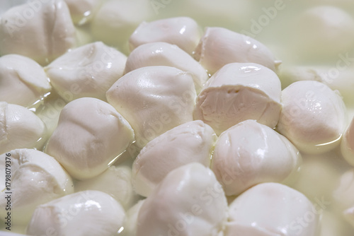 Fresh soft Italian white cheese mozzarella buffalo at the food market in Palermo. Sicily