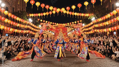 Lion dancers performing in front of a crowd with colorful lanterns at night