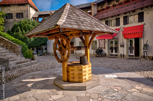 Lake Bled, Slovenia – July 22, 2025: Cobblestone courtyard and traditional buildings within the historic Bled Castle overlooking the lake.
