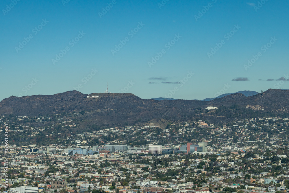 Obraz premium In the distance is Hollywoodland Sign and Griffith Observatory in the Santa Monica Mountains. from InterContinental Los Angeles Downtown by IHG, California